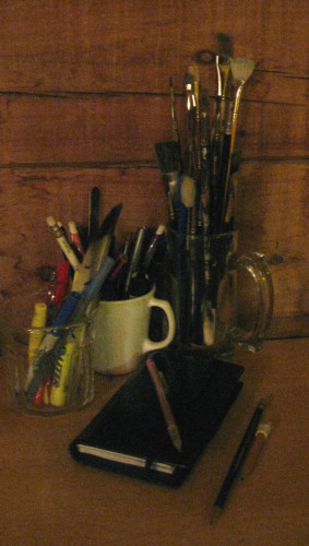 Pens, pencils and notebook